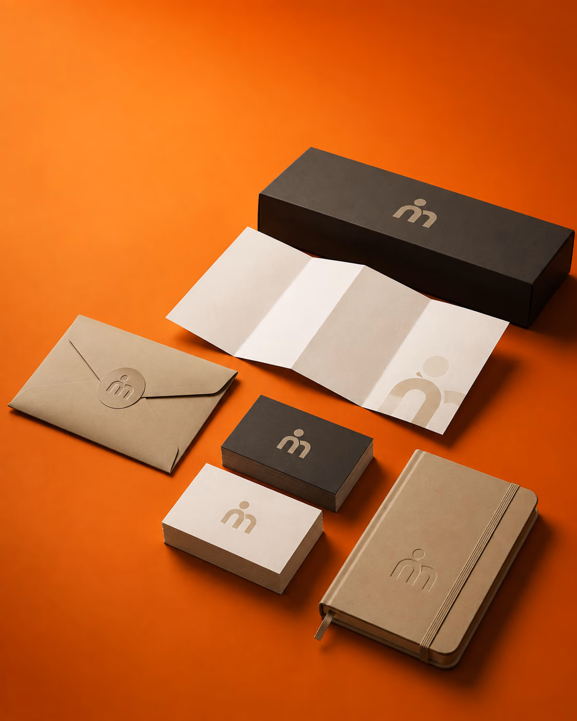 Visual identity system applied to brand stationery and packaging